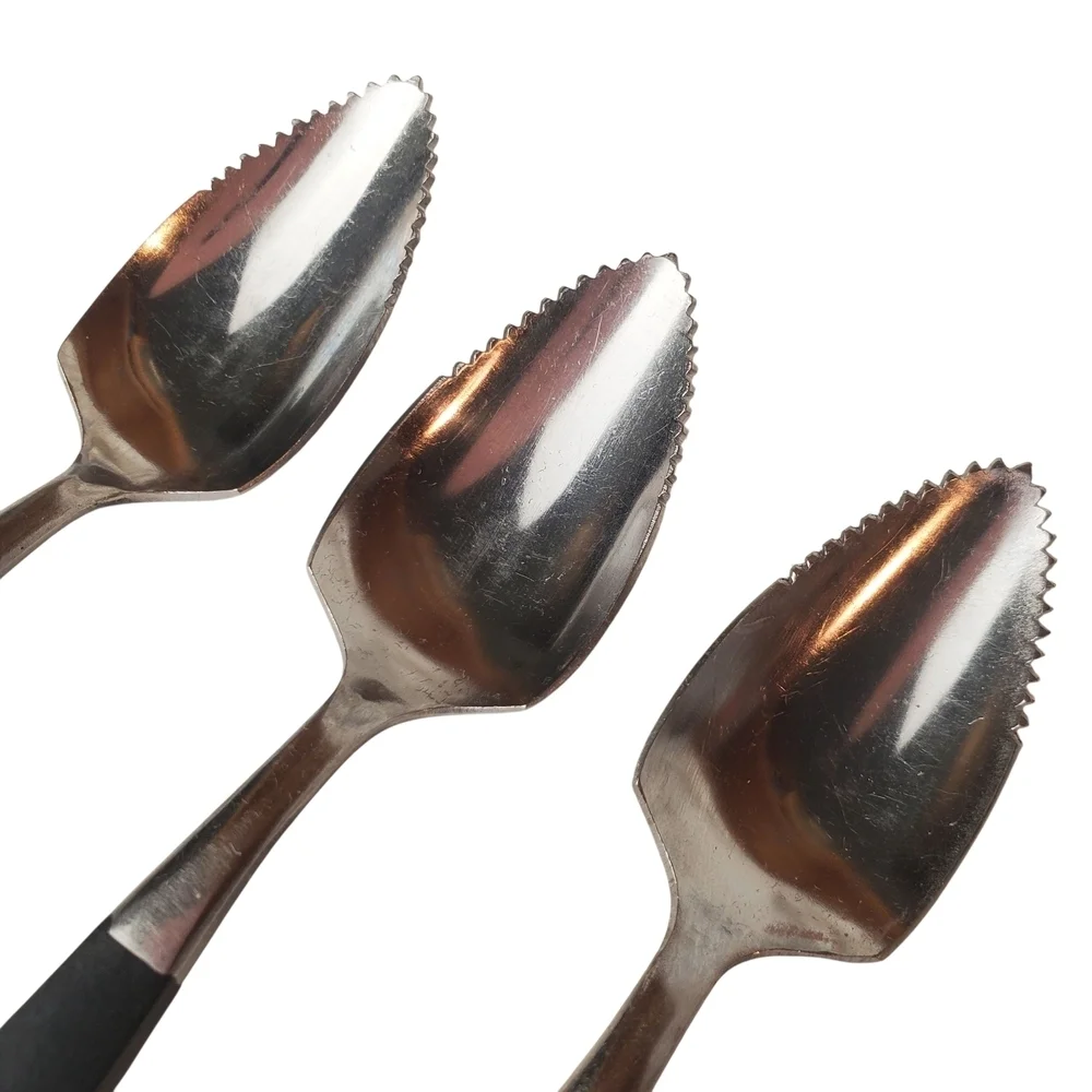 Set of Three MCM Black and Silver Grapefruit Spoons. Made In Japan.